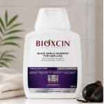 شامپو ضد ریزش بیوکسین مدل Black Garlic (سیر سیاه)